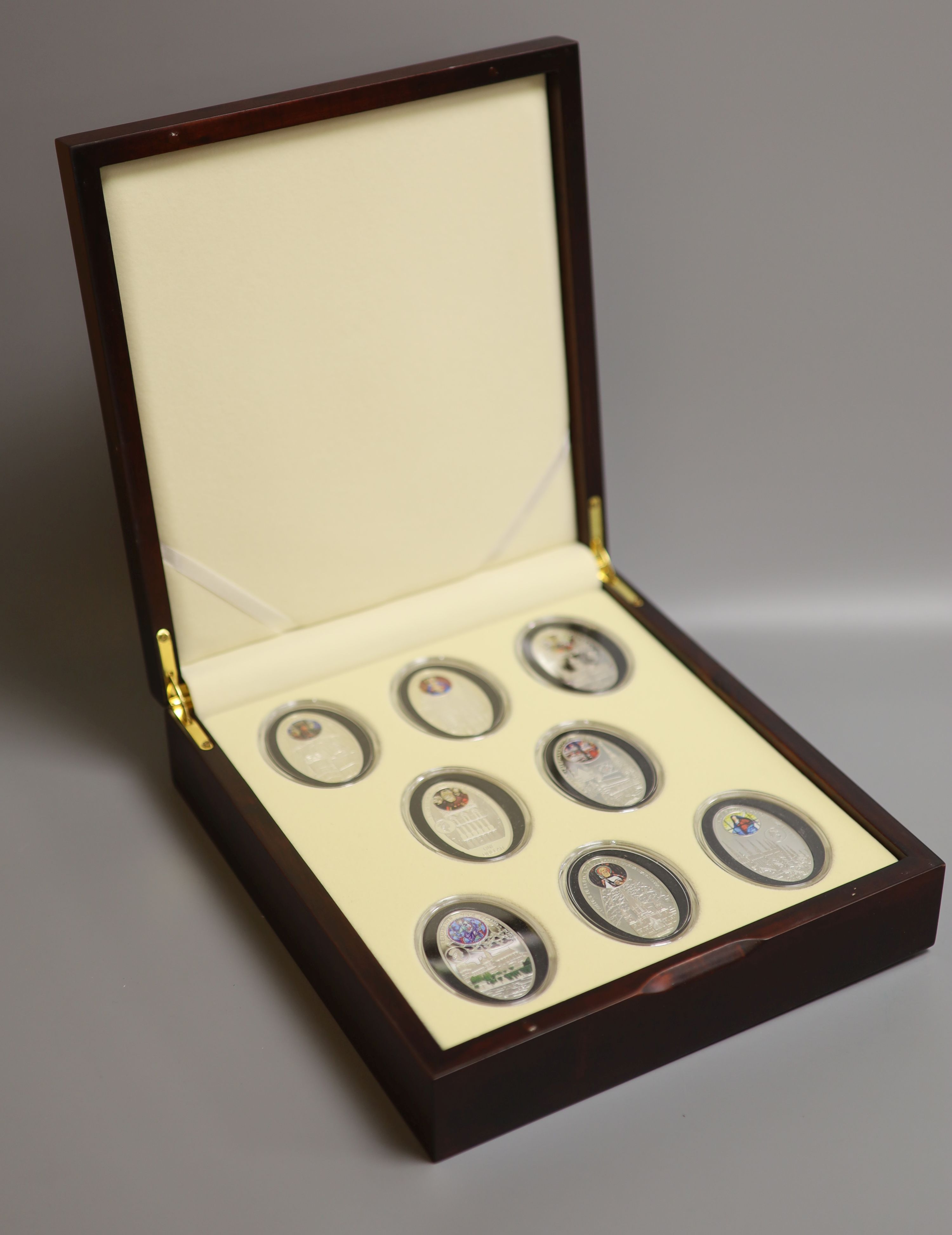 A BH Meyer Mint Niue Island cased set of eight $1 proof coins, each 28.28g